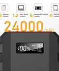 Display screen of Massive 24000mAh Portable Power Bank With 110V 65W AC Outlet showing 100% charge with device compatibility icons