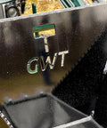 Close-up of Beefy Mini Wrecker Stump Bucket for Small Tractors with logo and serrated edges