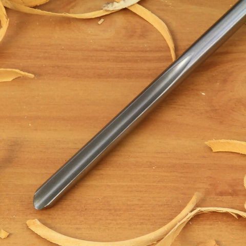 Kickass Three Piece HSS Bowl Gouge Set Featuring Solid Beech Handles For Flawless Bowl And Vessel Turnings heavy duty gouge close-up on wooden shavings.