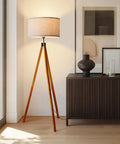 Eden Tripod Floor Lamp Dimmable LED With Solid Wood Legs, tall lamp beside modern cabinet in stylish living room setting
