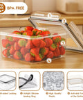 Transparent container from 40 Piece Airtight Food Storage Container Set With Lids, filled with strawberries, BPA free plastic.