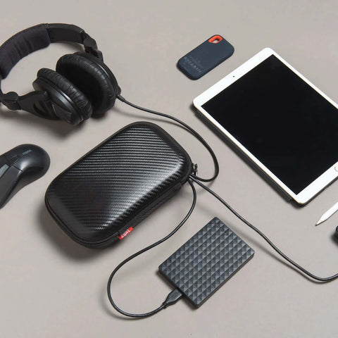 Dope Black Carbon Pencil Case With Hella Spacious Tech Stash And Badass Anti Scratch Shell designed for organizing tech accessories.