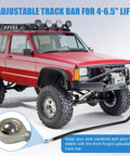 Beefed-Up Front Adjustable Track Bar For 4-6.5 Inch Lift Cherokee XJ 1984-2001 - Heavy Duty Forged Steel, Factory Style Bushing, Easy Adjust, Improves Alignment And Reduces Suspension Stress For 2WD And 4WD Jeep XJ installed on lifted red Jeep Cherokee XJ