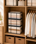 Giant Clear View Storage Bag For Blankets And Comforters Super Spacious Eighty Liter See Through Organizer stacked with rolled blankets.