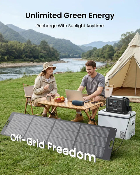 Couple camping with Go-To Portable Power Station 1024Wh LiFePO4 Battery, solar panel, and tent by a river