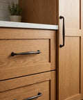 Oil Rubbed Bronze Cabinet Pulls 7 9 16 Inch Centers Six Pack Sleek Transitional Spindle Handles on wooden kitchen drawers