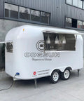 Heavy Duty Polished Mirror Food Trailer With Foldout Awning Fully Customizable Layout side view with shiny exterior and open awning.