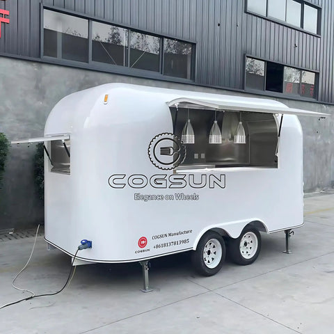 Heavy Duty Polished Mirror Food Trailer With Foldout Awning Fully Customizable Layout side view with shiny exterior and open awning.