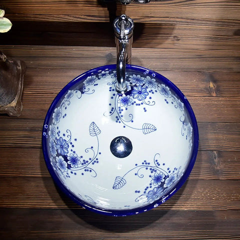 USZWBY Vessel Sinks Blue and White Porcelain Bathroom Basin Sink Round Ceramic Art Countertop Washbasin Bathroom Bowl Sink with floral design from above.