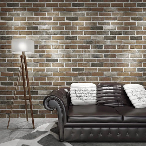 Peel And Stick Faux Brick 3D Wall Panels 10 Pack 52.5 Sq Ft In Gray Brown for Easy DIY Accent Walls in living room setting with sofa.