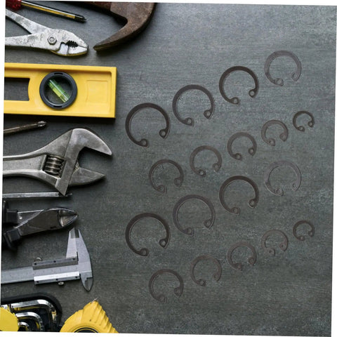 100 Piece External Snap Ring Set For Shafts And Machinery Sturdy Steel Circlips Assortment with tools on workbench
