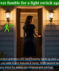 Woman approaching a door with illuminated 4 Pack Motion Sensor LED Light Bulbs 12W 100W Equivalent Dusk To Dawn A19 E26 LED Bulbs