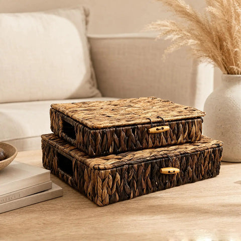 Two natural water hyacinth wicker storage baskets with lids set of 2 handwoven organizer bins on a wooden table.