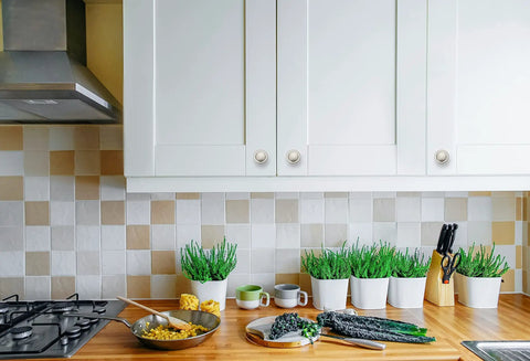 Sleek Brushed Nickel Round Knobs enhance kitchen cabinets, solid zinc material, ideal for modern renovations and aesthetics.