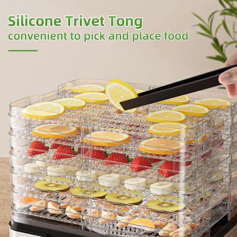 Straight Up Stainless Steel Food Dehydrator For Real Deal Jerky Drying And Heavy Duty Meat Dehydration With Seven Adjustable Trays And Smart Digital Timers Plus Easy Clean Design showing trays of fruits and silicone tongs.