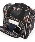 Valentina Underseat Wheeled Carry On Luggage With Floral Branch Design showing front pocket open with notebook and passport