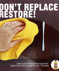 Person using a yellow cloth to clean wood cabinet with Top Shelf Furniture Polish And Wood Cleaner With Real Lemon Oil Delivers A Knockout Shine On Hardwood Floors And Kitchen Cabinets Deep Cleans And Nourishes For A Smooth Finish Solid Value Pack Of Six 12 Oz Bottles.