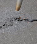 Application of 125 Feet Of Blacktop Crack Filler For Asphalt And Concrete Weather Resistant No VOCs on pavement crack