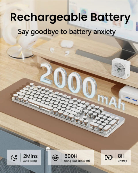 Wireless Typewriter Style Mechanical Keyboard With Clicky Blue Switches And Crisp White Backlighting To Give Your Desk A Kickin Retro Vibe And Legit Smooth Typing Sessions displayed on a desk with rechargeable battery details.