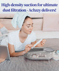 Pro Grade High Density Replacement Filter Two Pack for Nail Dust Collectors in use, woman filing nails on bed with filter.