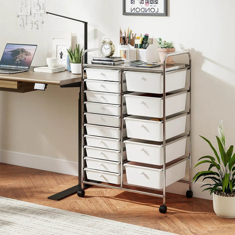 Grab-And-Go 15-Drawer Rolling Utility Cart With Lockable Wheels, metal frame, in a home office setup with plants and desk.