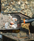 Heavy Duty Ash Shovel For Fire Pits And Grills, Manganese Steel Ember Remover 12.6 Inch Wood Stove Scoop with embers close-up