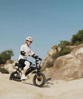 Rider on 16 Inch Fat Tire Electric Bike For Adults And Teens With Peak 1500W Motor 28 MPH Top Speed 65 Mile Range Ebike on rocky terrain