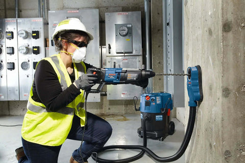 Bosch Bulldog SDS-Plus rotary hammer bit, 1/2 in. x 6 in. x 8 in., installed in a blue Bosch hammer drill.