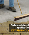 Person applying Titanium Gray Heavy Duty Polymeric Sand For Patio Paver Joints And Stone Gaps Featuring Ceramic Flex Technology.