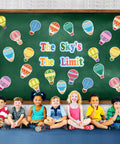 68 Pcs Hot Air Balloon Classroom Bulletin Board Decorations Kit For Back To School, Inspirational Quote Cutouts on a green board with children