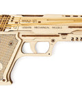 Wolf 01 Handgun 3D Wooden Puzzle Kit For Adults With Mechanical Moving Parts And Realistic Wood Model Gun Brain Teaser And Hobby Set Quick 60 To 90 Minute Assembly No Glue Needed Great Gift For DIYers. wooden handgun puzzle kit, side view