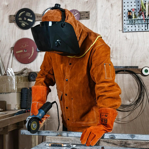 Person wearing Leather Welding Hood With Neck Drape And Full Head Coverage using angle grinder, heavy duty cowhide, flame retardant Kevlar stitching.
