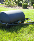 Spyker 300lb Push Tow Commercial Lawn Roller With No Tools Handle, Beefy Heavy Duty Drum on grass, close-up view