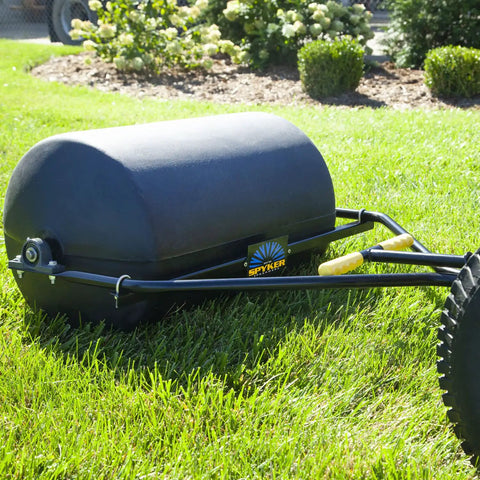 Spyker 300lb Push Tow Commercial Lawn Roller With No Tools Handle, Beefy Heavy Duty Drum on grass, close-up view