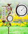32-Inch Garden Rain Gauge With Thermometer And Metal Bird Statue displayed outdoors with glass tube and bronze finish.