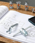 Top Shelf Heavy Duty Steel Fire Sprinkler Wrench For Recessed Heads Built To Last With A Kickass Design shown with plans on wood table.