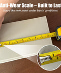 No Fuss 4 In 1 Laser Tape Measure With Slick 328ft Digital Distance Meter showing anti-wear scale measuring a surface.