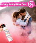 Epic Gender Reveal Fire Extinguisher Multipack Featuring Snazzy Biodegradable Color Powder Blasters in use with couple among pink smoke.