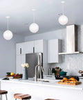 Leo Hanging Globe Pendant Light Contemporary One Light Fixture In White Finish for kitchen island ambience