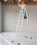 7 In 1 Folding Ladder With 15 Foot Reach Aluminum Construction For Indoor And Outdoor Use Multi Position A Frame Scaffold with man reaching ceiling