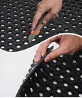 Close-up of Anti Fatigue Drainage Rubber Floor Mat Roll 83 by 36 Inch showing cutting and flexibility features for indoor wet areas.