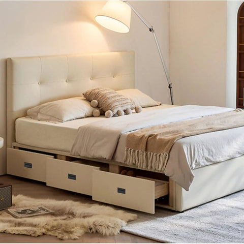 Modern bed with built-in storage drawers and cozy bedding in a softly lit bedroom