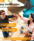 Couple installing 42 Inch Black Ceiling Fan With Light And Remote Control in living room, showing easy assembly.
