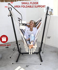 Double Hammock Chair With Stand in Boho Bohemian Style with Tassels and Phone Holder in use on a patio.