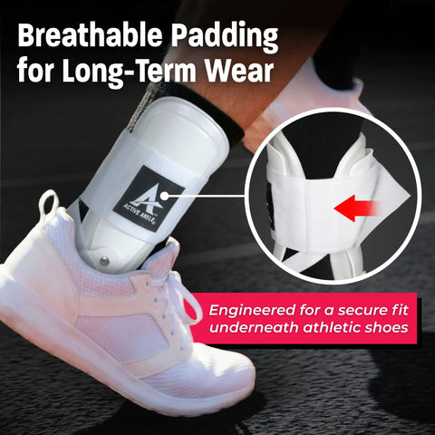 Rigid U Shaped Ankle Brace For Sprained Ankles Medium White Left Or Right Foot Fits Men 7 To 10 And Women 8 To 11 Lightweight EVA Padding Adjustable Brace For Volleyball And Cheerleading Game Day Ready Maximum Stability During Play, shown under athletic shoe