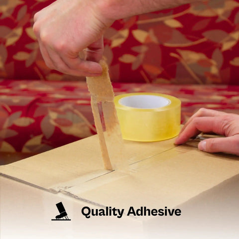 No Frills Clear Packing Tape Two Point Five Mil Thick One Point Eight Eight Inches Wide Six Pack Machine Length Rolls in use sealing box.