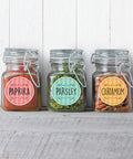Slick Round Printable Labels 1 2/3 Inch Matte White 600 Count on spice jars displaying Paprika, Parsley, and Cardamom labels.