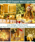 Lit 165Ft Ultra Long Copper Wire String Lights With 500 LEDs used in holiday decor with reindeer and gifts