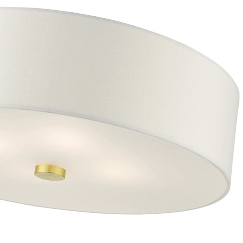 Meridian Collection 4-Light Semi-Flush Mount Ceiling Light With Off-White Fabric Shade In Satin Brass Finish, close-up view.