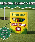 Funny Golf Tees For Men 10 Pack Bamboo Wooden Tees Lit Gift Set packaging on a golf course with colorful tees visible